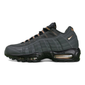 Central Cee x Air Max 95 Live Yours - Heel Close Up Detail Showing Copper Nike Air Branding and Copper Heel Counter on Green Background