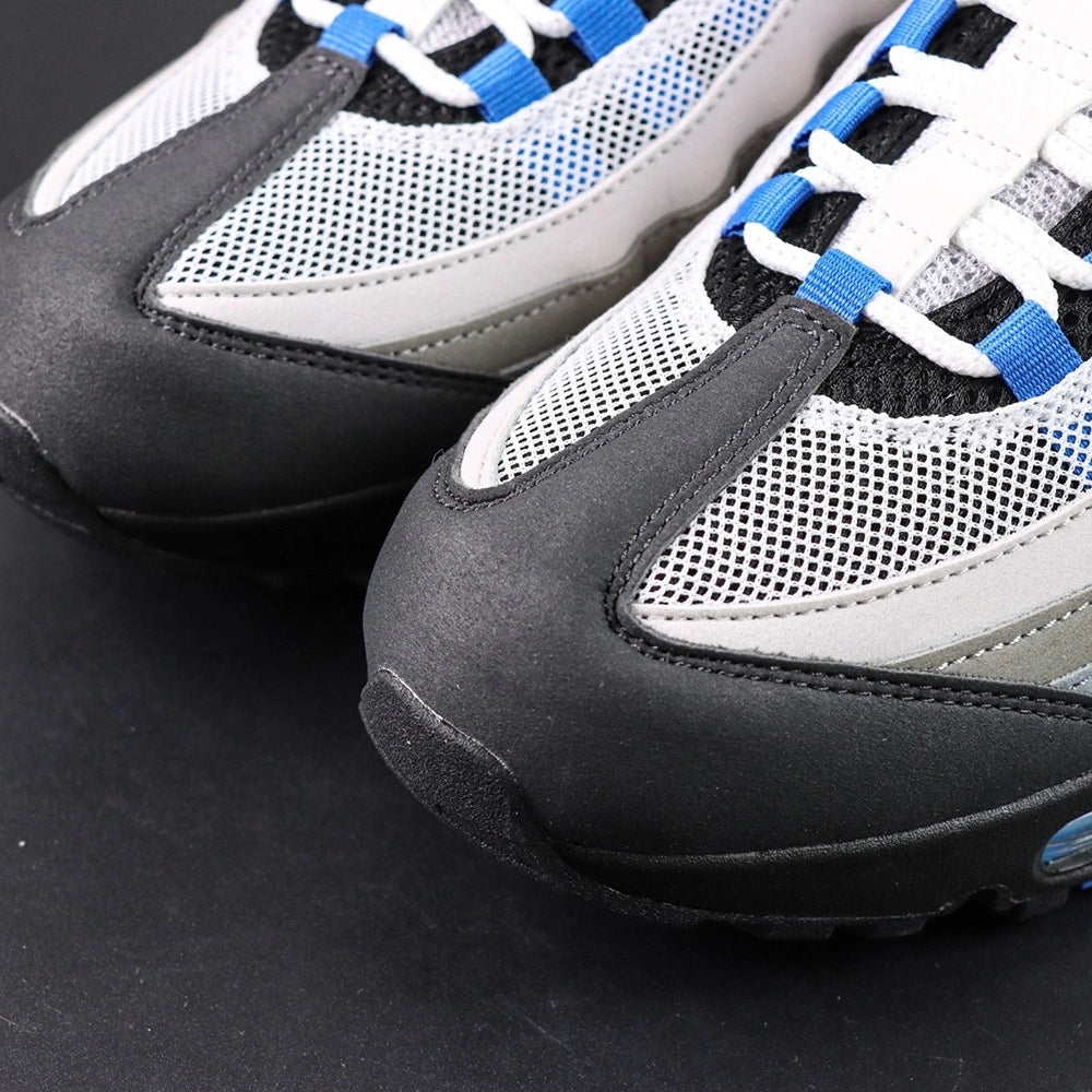 Air Max 95 OG Blue Spark 2025 - Lateral Side View on Sofa