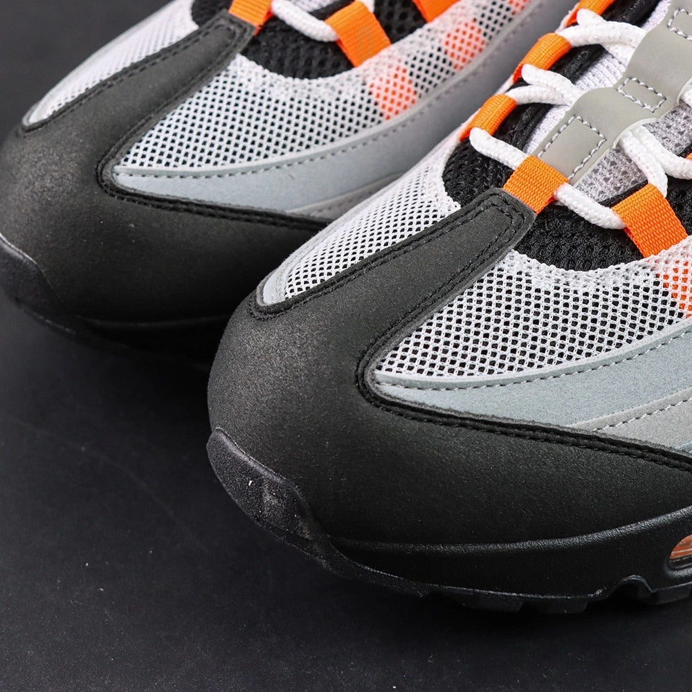 Air Max 95 OG Bright Mandarin 2025 - Pair Top View on Dark Background