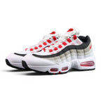 Air Max 95 OG Comet Red 2026 - Lateral Side View on Sofa