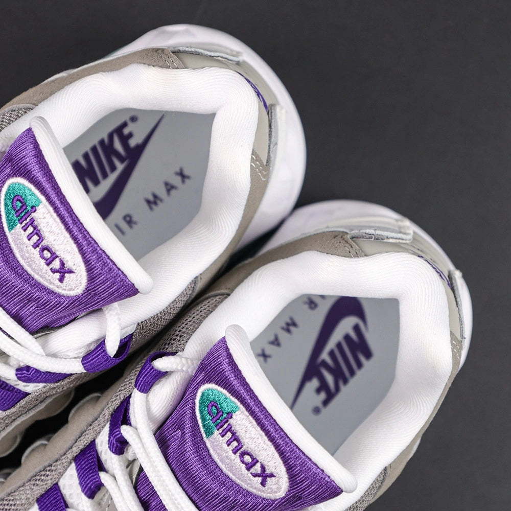 Air Max 95 OG Grape 2026 - Lateral Side View on Sofa