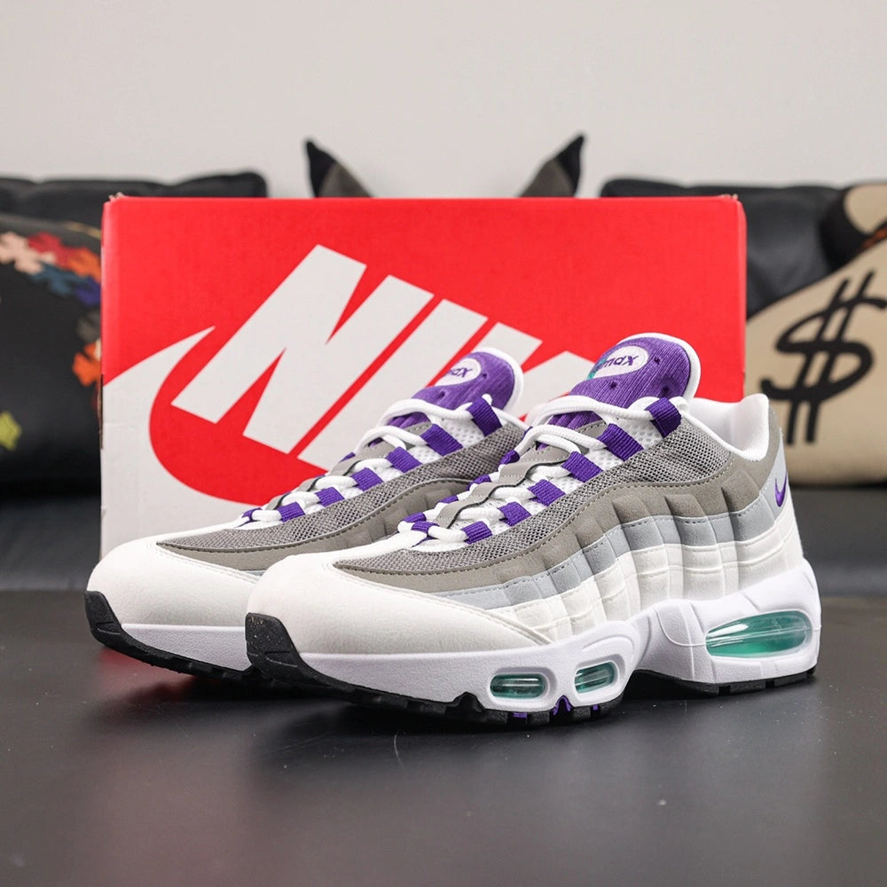 Air Max 95 OG Grape 2026 - Heel Pair View on Sofa
