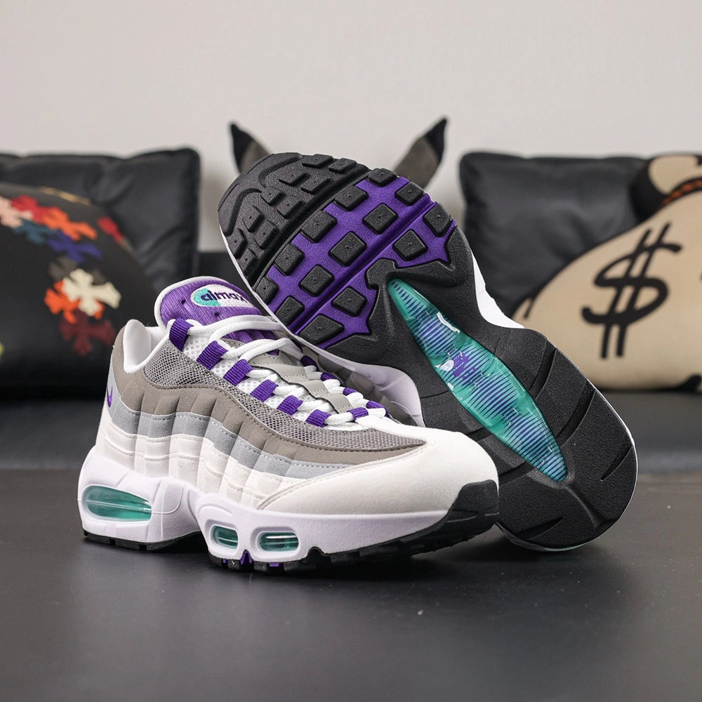 Air Max 95 OG Grape 2026 - Three Quarter Front View on Sofa