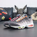 Air Max 95 OG Greedy What The 2026 - Outsole and Side View on Sofa