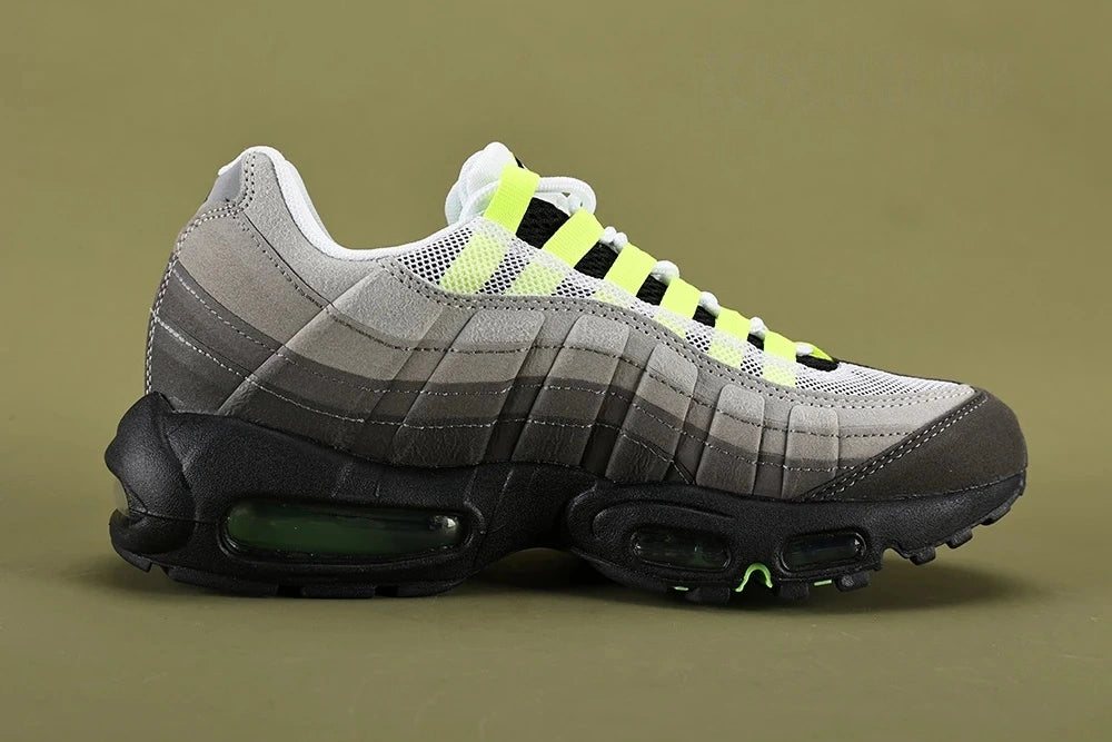 Air Max 95 OG Neon Latest Version - Pair Three Quarter View on Olive Background