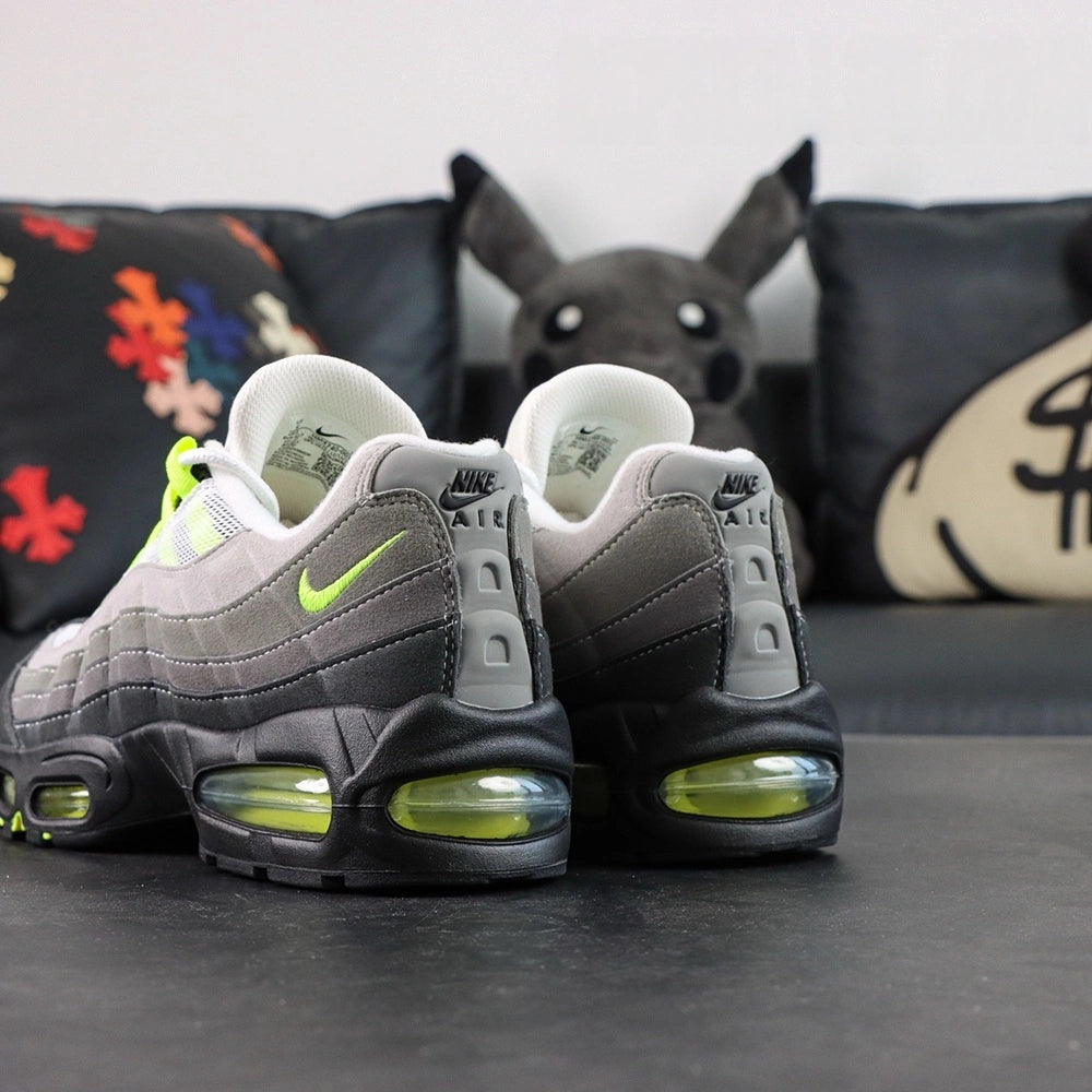 Air Max 95 OG Neon 2025 - Lateral Side View on Sofa with Pikachu