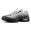Air Max 95 OG Pink Foam 2025 - Pair with Outsole Displayed on Sofa