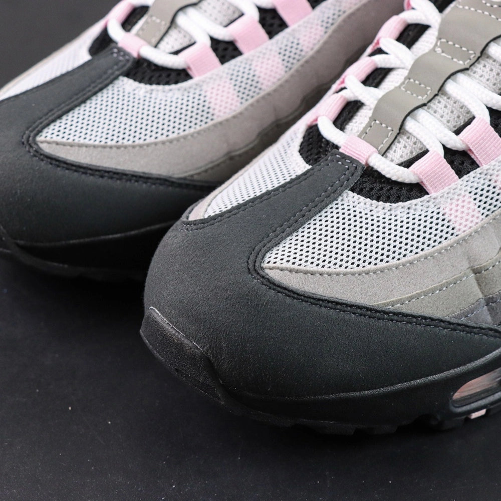 Air Max 95 OG Pink Foam 2025 - Medial Side View on Sofa