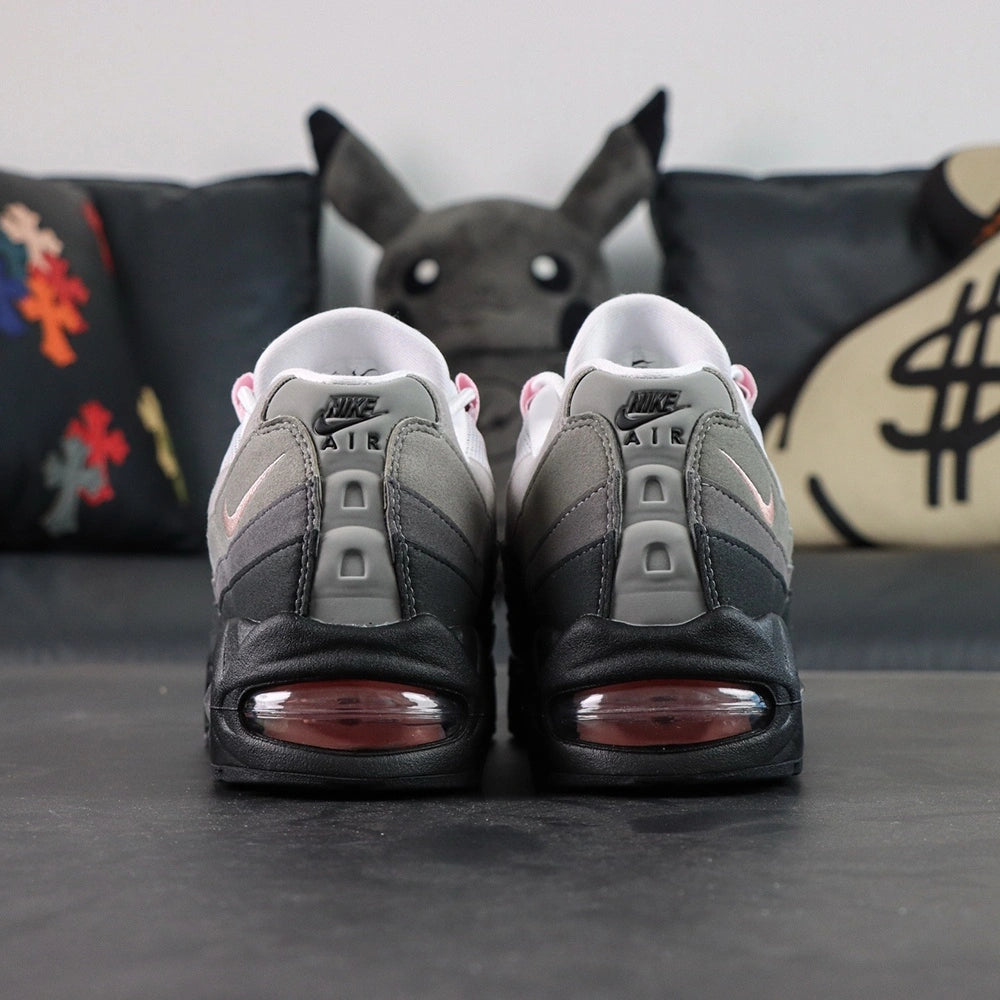 Air Max 95 OG Pink Foam 2025 - Lateral Side View on Sofa
