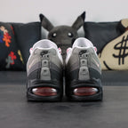 Air Max 95 OG Pink Foam 2025 - Lateral Side View on Sofa