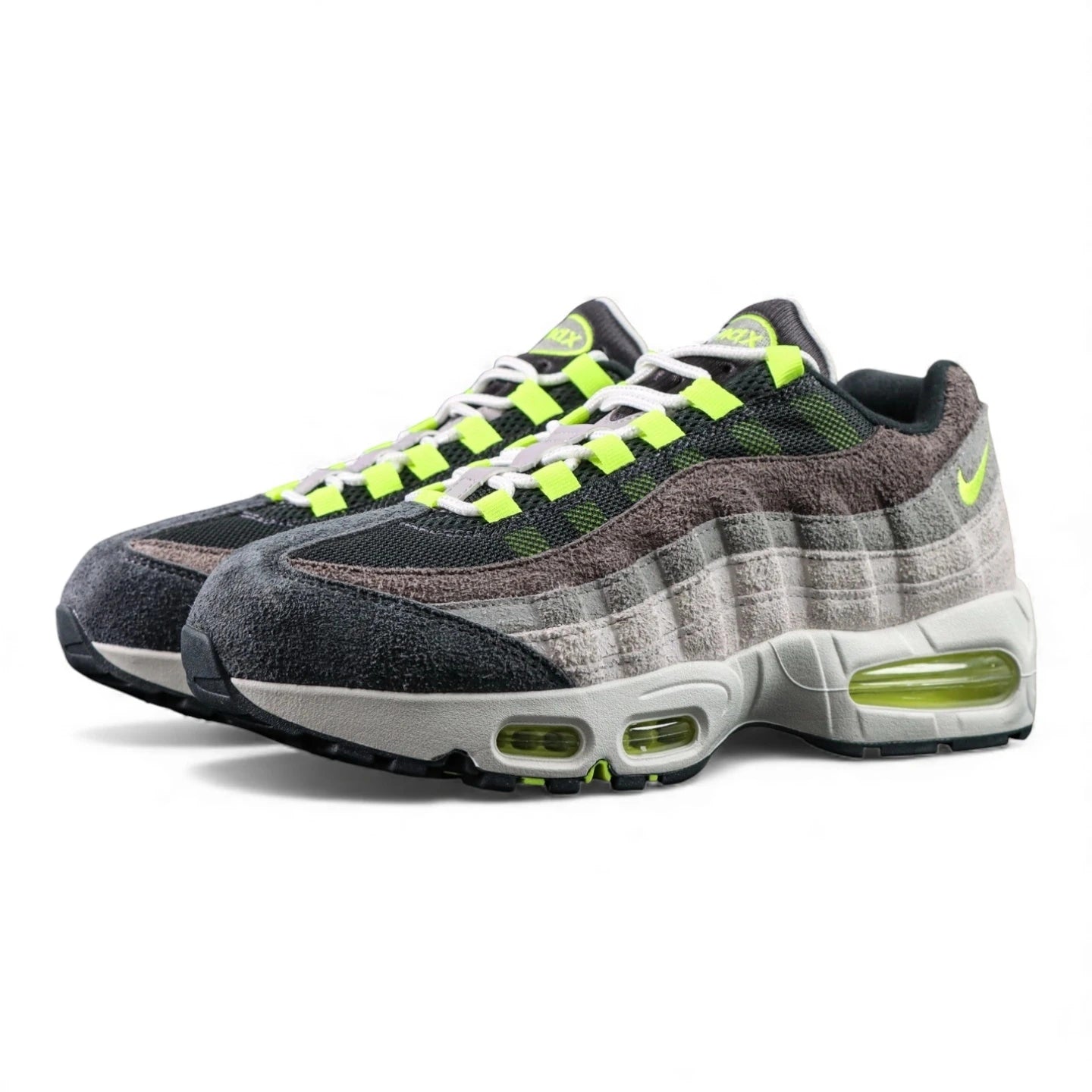 Air Max 95 OG Reverse Neon 2025 - Heel Pair View with Volt Air Units on Sofa