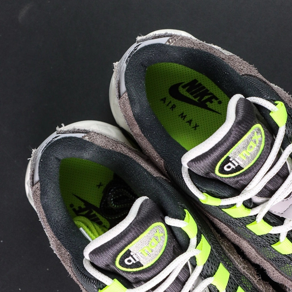 Air Max 95 OG Reverse Neon 2025 - Heel Pair Rear View on Sofa with Pikachu