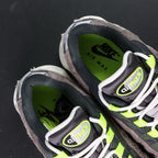 Air Max 95 OG Reverse Neon 2025 - Heel Pair Rear View on Sofa with Pikachu
