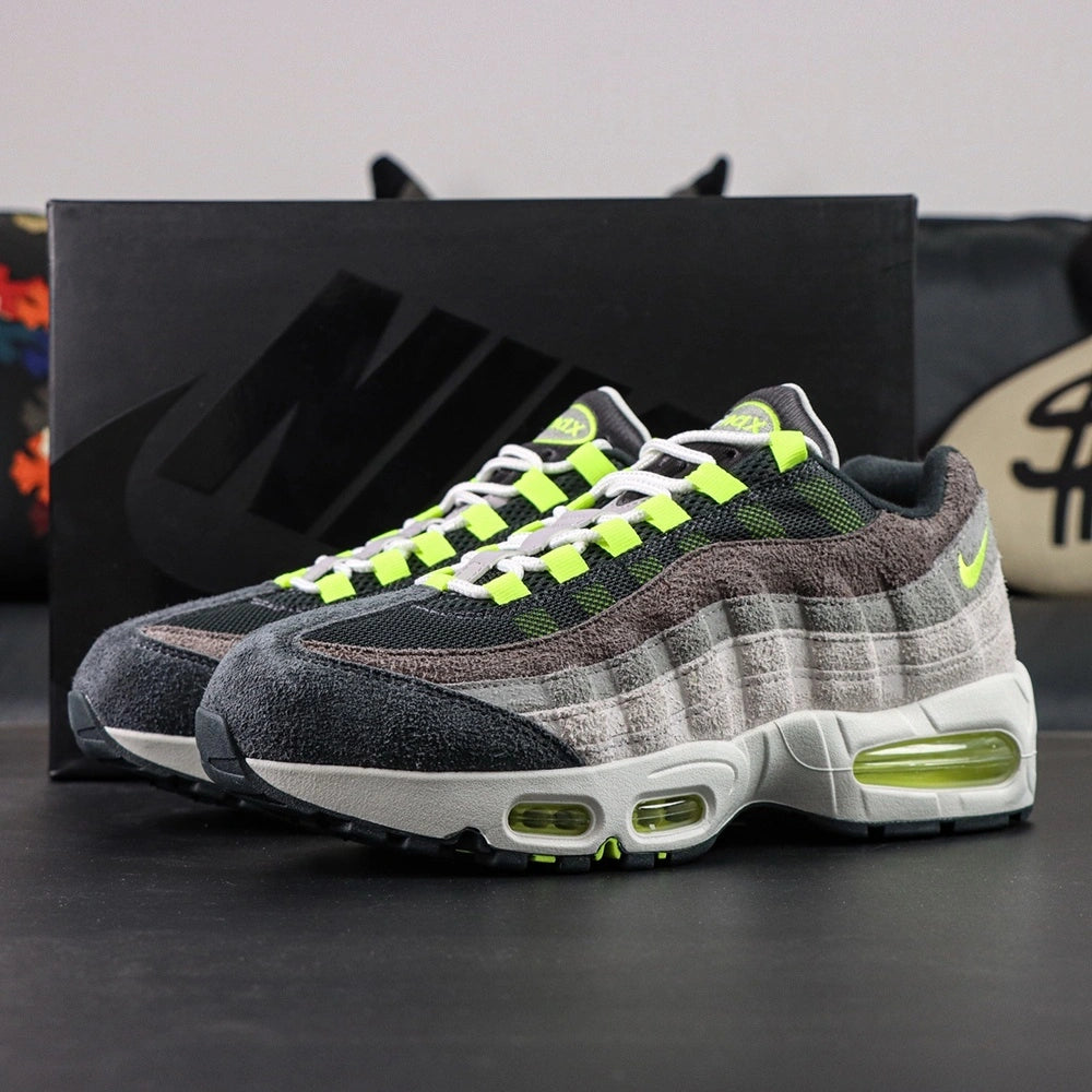 Air Max 95 OG Reverse Neon 2025 - Pair with Outsole Displayed on Sofa