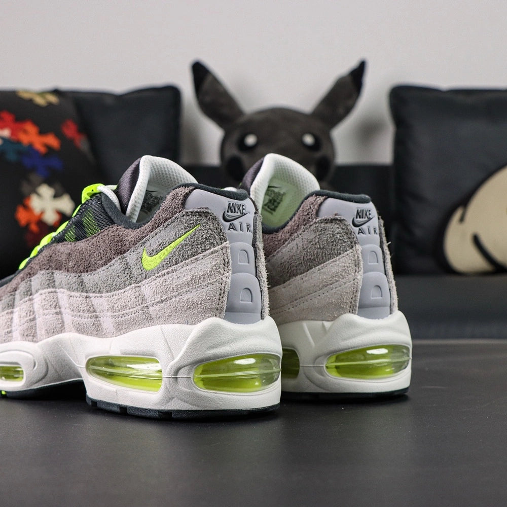 Air Max 95 OG Reverse Neon 2025 - Three Quarter Front View on Sofa with Pikachu