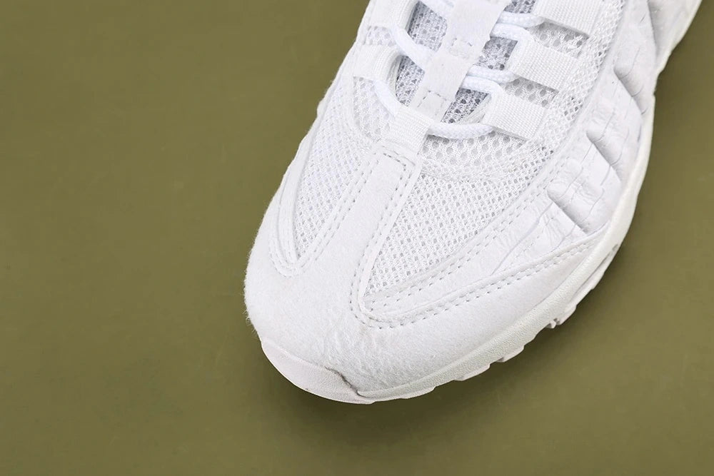 Air Max 95 Triple White Men's - Lateral Side View on Olive Background