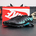 Air Max Plus Black Dusty Cactus 2025 - Three Quarter Lateral View with Pikachu on Sofa