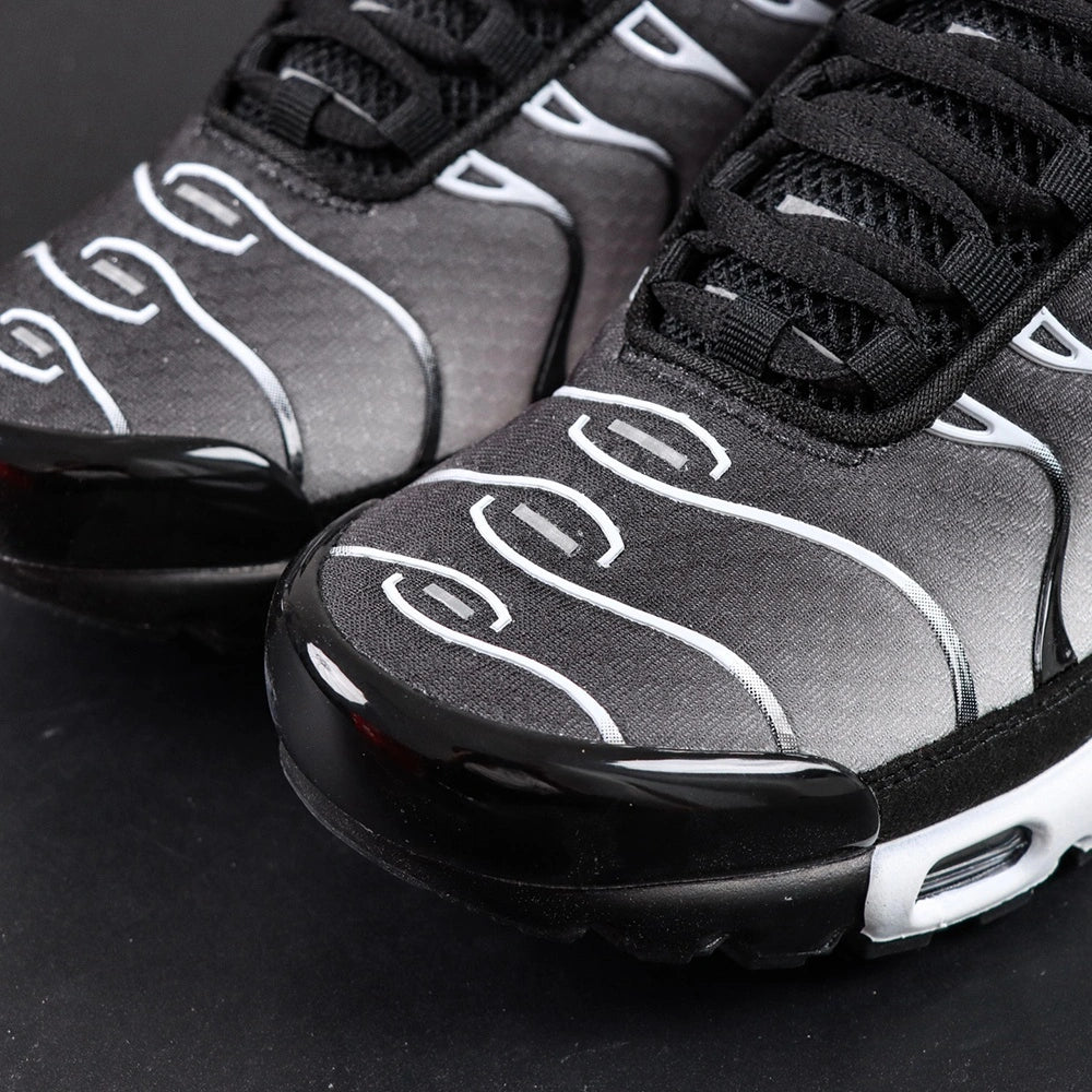 Air Max Plus Black Metallic Silver - Lateral Side View with Pikachu on Sofa