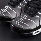 Air Max Plus Black Metallic Silver - Lateral Side View with Pikachu on Sofa