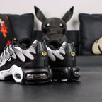 Air Max Plus Black Metallic Silver - Pair Top Down View on Dark Background