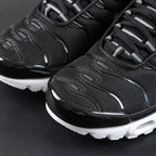 Air Max Plus Black White - Three Quarter Lateral View with Pikachu on Sofa