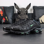 Air Max Plus Green Strike - Pair Top Down View on Dark Background