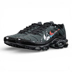 Air Max Plus Multi Swoosh Black Bright Crimson 2023 - Lateral Side View with Pikachu on Sofa
