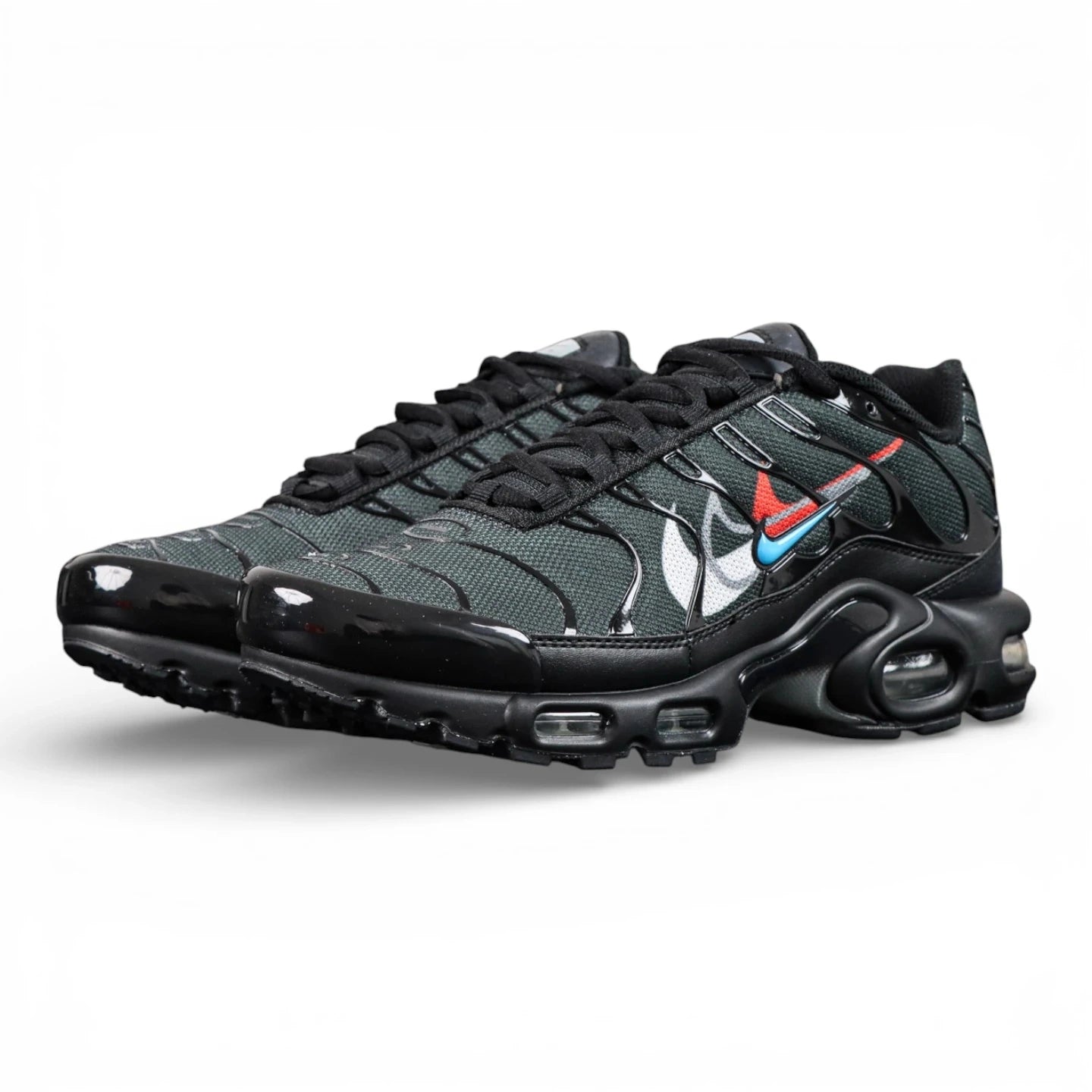 Air Max Plus Multi Swoosh Black Bright Crimson 2023 - Lateral Side View with Pikachu on Sofa