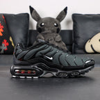 Air Max Plus Multi Swoosh Black Bright Crimson 2023 - Toe Box Close Up Detail on Dark Background