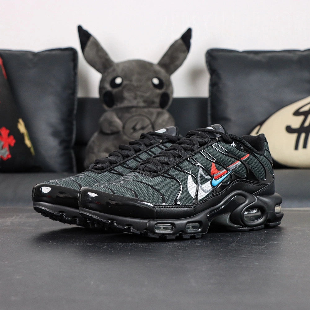 Air Max Plus Multi Swoosh Black Bright Crimson 2023 - Heel Pair Rear View with Yellow Tn Air Badge and Pikachu on Sofa