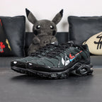 Air Max Plus Multi Swoosh Black Bright Crimson 2023 - Heel Pair Rear View with Yellow Tn Air Badge and Pikachu on Sofa