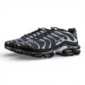 Air Max Plus Premium Black Metallic Silver 2024 - Pair Top Down View on Dark Background Showing Reflective Silver Wave Panels