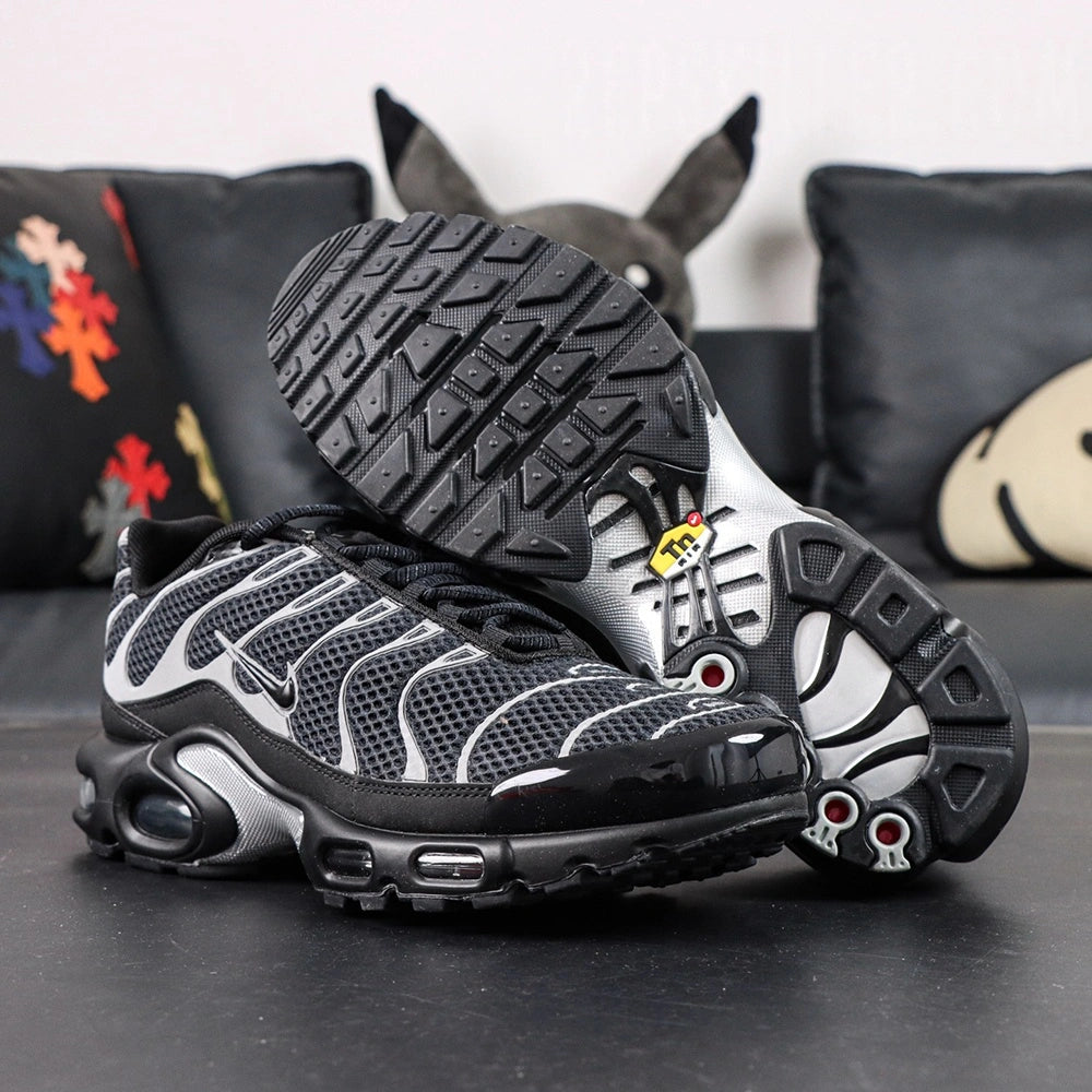 Air Max Plus Premium Black Metallic Silver 2024 - Pair Three Quarter View on Dark Background