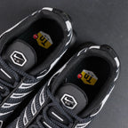 Air Max Plus Premium Black Metallic Silver 2024 - Three Quarter Lateral View with Pikachu on Sofa