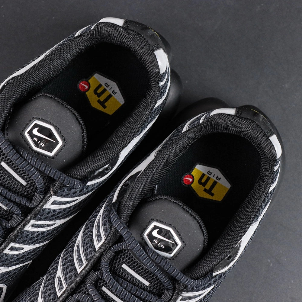 Air Max Plus Premium Black Metallic Silver 2024 - Three Quarter Lateral View with Pikachu on Sofa