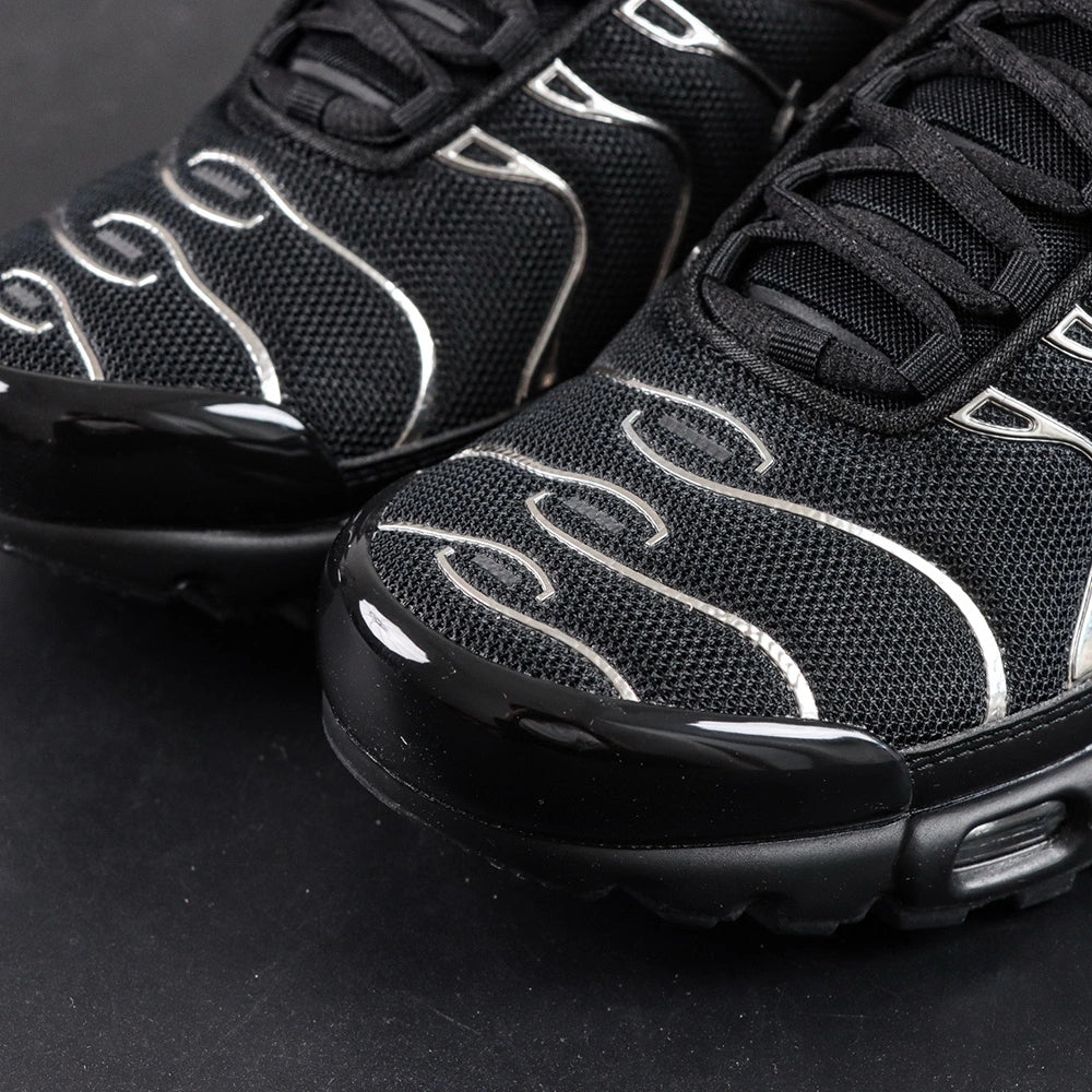 Air Max Plus SE Black Chrome Silver 2024 - Pair Three Quarter View on Dark Background