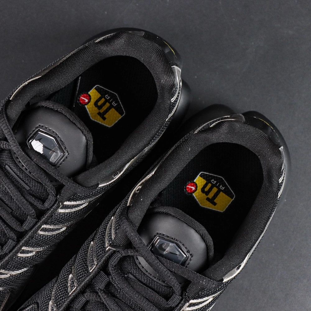Air Max Plus SE Black Chrome Silver 2024 - Lateral Side View with Pikachu on Sofa