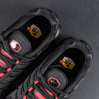 Air Max Plus Sith Lightsaber - Toe Box Close Up Detail Showing Red Wave Panel Underlays and Red Lace Loops on Dark Background