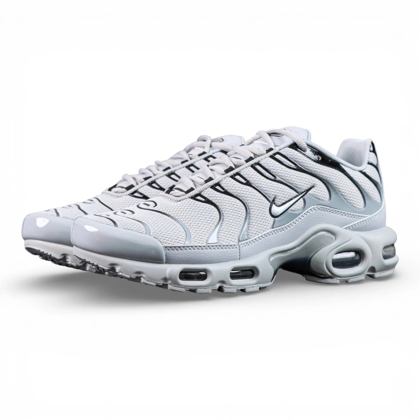 Air Max Plus TN Wolf Grey 2018 - Heel Pair Rear View with Yellow Tn Air Badge and Pikachu on Sofa