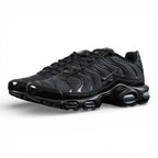 Air Max Plus Triple Black 2017 - Heel Pair Rear View with Yellow Tn Air Badge and Pikachu on Sofa