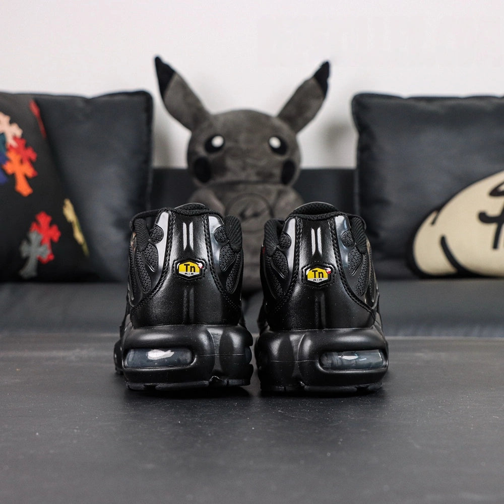Air Max Plus Triple Black 2017 - Lateral Side View with Pikachu on Sofa