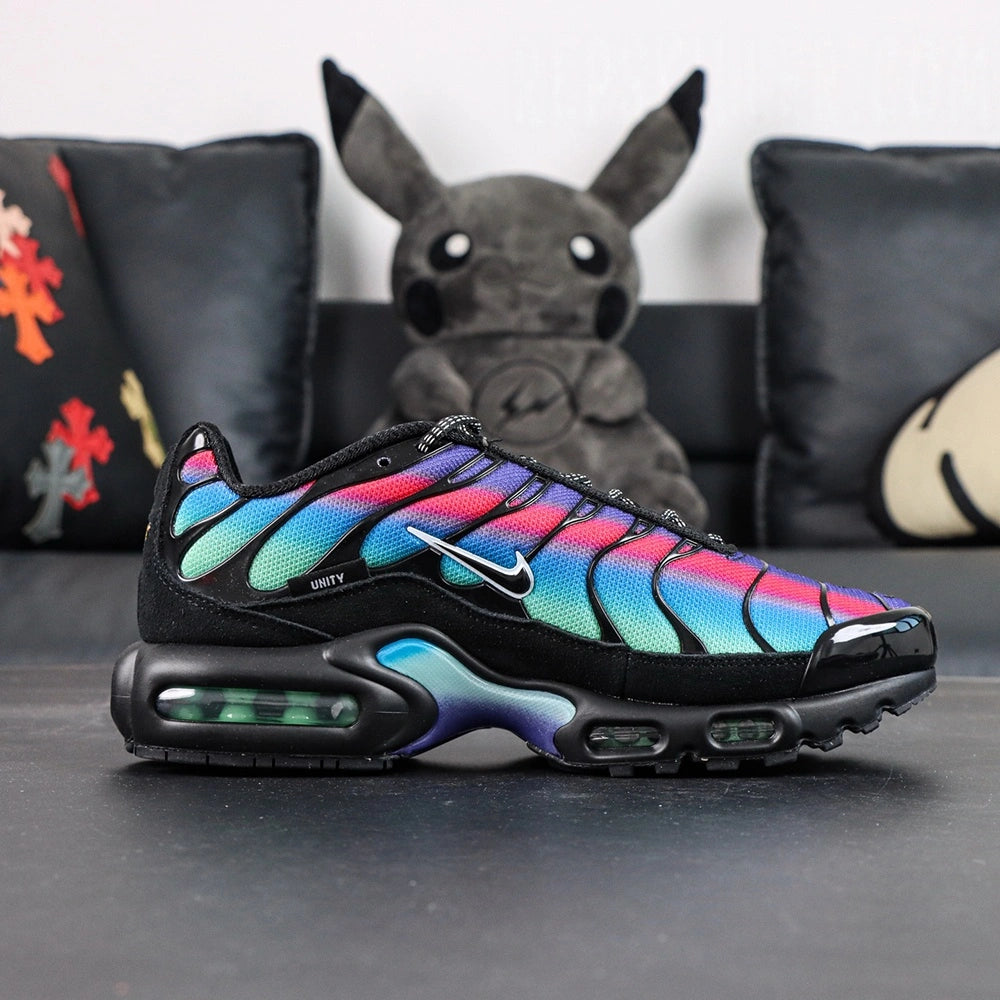 Air Max Plus Unity - Pair Top Down View on Dark Background Showing Full Rainbow Gradient Upper and White Swoosh