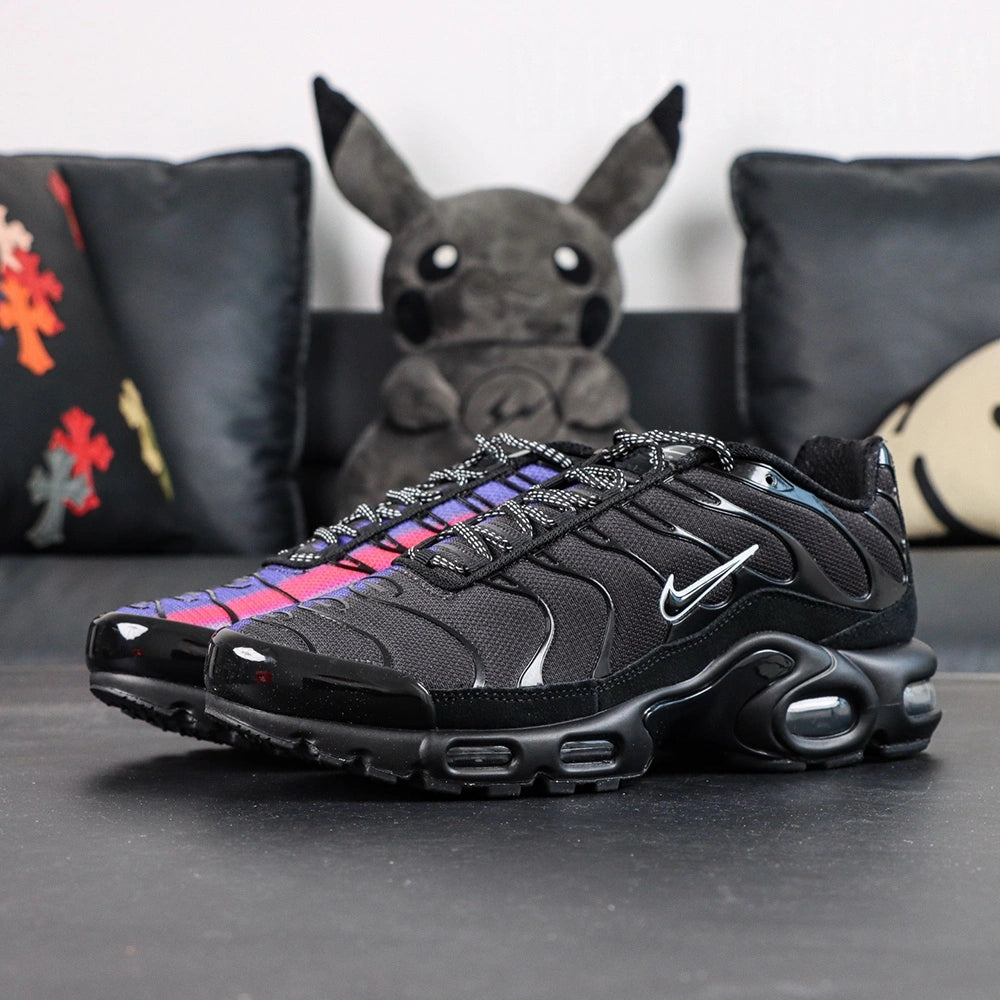 Air Max Plus Unity - Heel Pair Rear View with Yellow Tn Air Badge and Pikachu on Sofa Showing Iridescent Heel Wave Panels