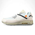 Air Max x Off-White 90 The Ten - Heel Pair Rear View Showing Ice Blue Collar Lining and Suede Heel Counter with Orange Zip-Tie Accessory on Sage Background