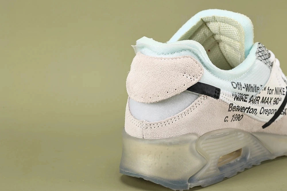 Air Max x Off-White 90 The Ten - Three Quarter Lateral View Showing Black Zip-Tie Strap LACES Tongue Text and Diamond Mesh Panel on Sage Background