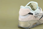 Air Max x Off-White 90 The Ten - Three Quarter Lateral View Showing Black Zip-Tie Strap LACES Tongue Text and Diamond Mesh Panel on Sage Background