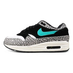 Atmos x Air Max 1 Premium Retro Elephant 2017 - Three Quarter Lateral View Showing Grey Elephant Print Toe Box and Emerald Green Swoosh on Sage Background