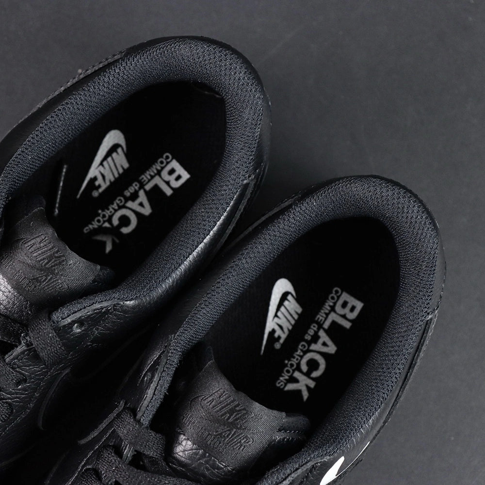 BLACK Comme des Garcons x Air Force 1 Low Retro Black - side profile lifestyle
