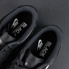 BLACK Comme des Garcons x Air Force 1 Low Retro Black - side profile lifestyle