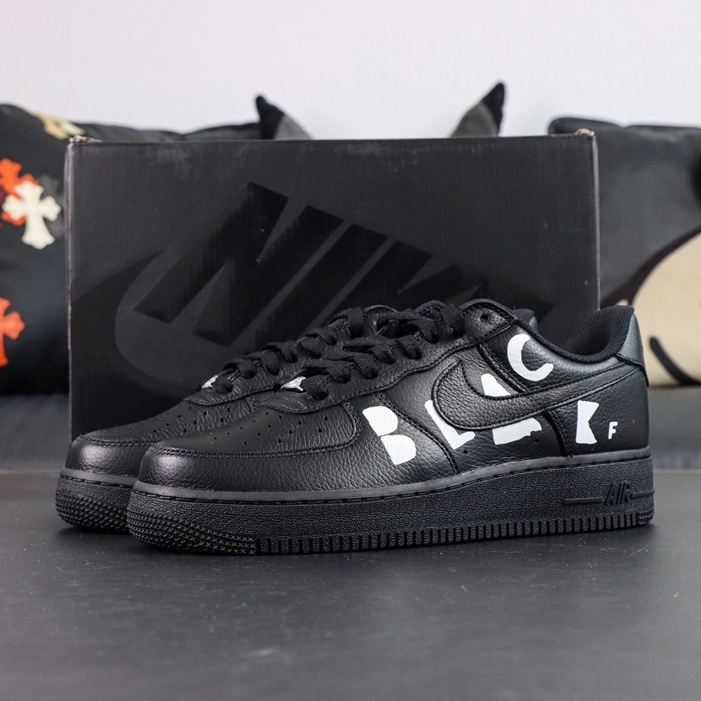 BLACK Comme des Garcons x Air Force 1 Low Retro Black - side profile with Pikachu